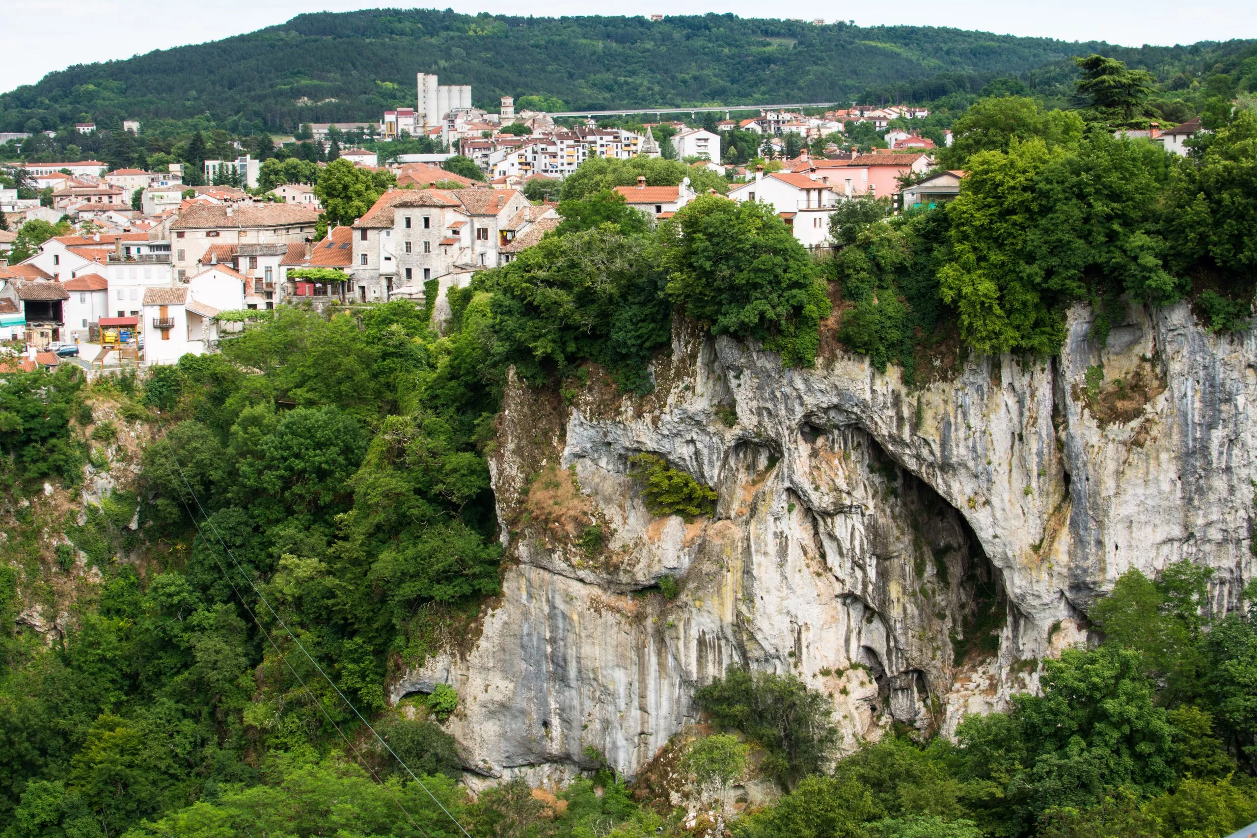 Canyon Pazinska Jama, mountains and aerial view of old districts of Pazin, Historical center of Istria, Croatia