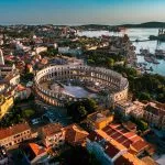 L'Arena di Pola al tramonto - Vista aerea HDR ripresa da un drone professionale. L'anfiteatro romano di Pola, Croazia