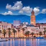 Split, Croatia. View of Split - the second largest city of Croatia at night. Shore of the Adriatic Sea and famous Palace of the Emperor Diocletian. Traveling concept. Mediterranean countries.